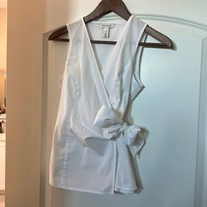 Sleeveless wrap top with bow tie detail